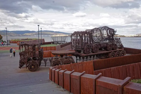 Flatbed Truck, Trailer and Cement Truck (Wim Delvoye)